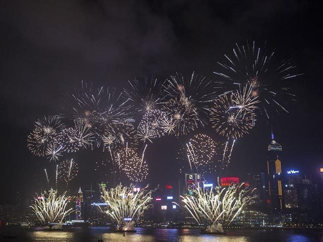 Fireworks are seen over Victoria Harbour to celebrate the Lunar New Year in Hong Kong on F