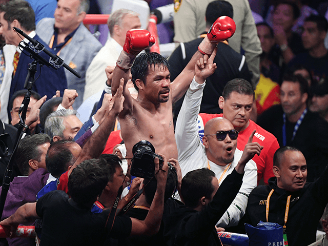 Manny Pacquiao celebrates his split-decision victory over Keith Thurman in their WBA welterweight title fight at MGM Grand Garden Arena on July 20, 2019 in Las Vegas, Nevada. (Photo by Ethan Miller/Getty Images)