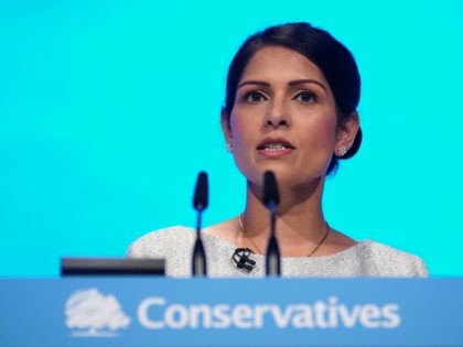 MANCHESTER, ENGLAND - OCTOBER 01: Home Secretary, Priti Patel addresses the delegates on the third day of the Conservative Party Conference at Manchester Central on October 1, 2019 in Manchester, England. Despite Parliament voting against a government motion to award a recess, Conservative Party Conference still goes ahead. Parliament will …