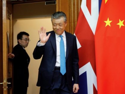 China's ambassador to Britain Liu Xiaoming passes a Union flag and the national flag of China, as he arrives to speak to members of the media at the Chinese Embassy in London on February 6, 2020, during a press conference relating to the coronavirus strain 2019-nCov outbreak in Wuhan, Hubei …