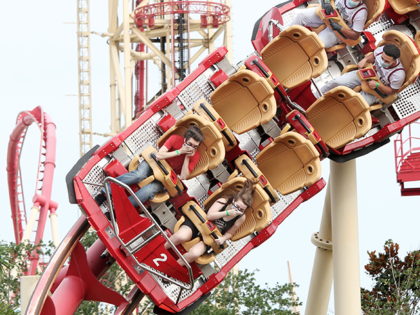 Visitors ride the Hollywood Rip Ride Rockit roller coaster at Universal Studios theme park