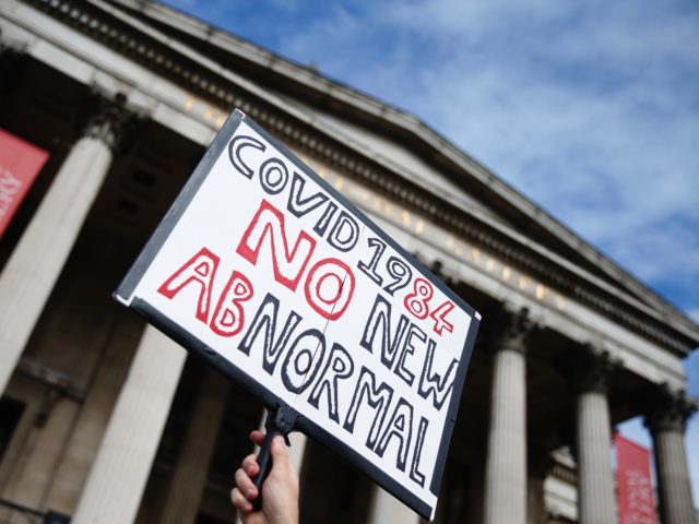 LONDON, ENGLAND - SEPTEMBER 26: Demonstrators attend a "We Do Not Consent" anti-mask rally at Trafalgar Square on September 26, 2020 in London, England. Thousands of anti-mask demonstrators protested in Trafalgar Square after the British government imposed tighter coronavirus laws this week. (Photo by Hollie Adams/Getty Images)