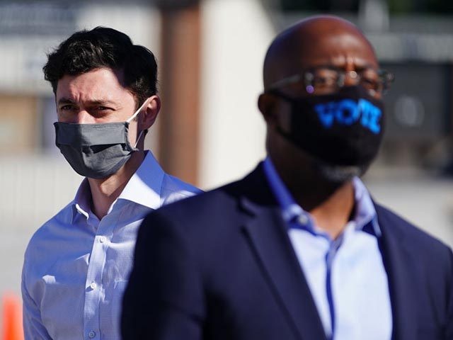 LITHONIA, GA - OCTOBER 03: Democratic U.S. Senate candidates Jon Ossoff and Rev. Raphael Warnock are seen at a campaign event on October 3, 2020 in Lithonia, Georgia. The two are hoping to unseat incumbent Senators David Perdue and Kelly Loeffler. (Photo by Elijah Nouvelage/Getty Images)