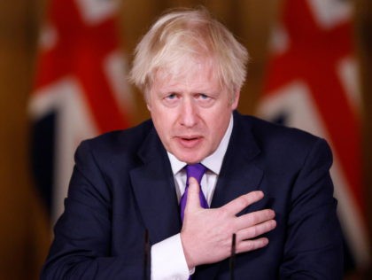 LONDON, UNITED KINGDOM - DECEMBER 2: Britain's Prime Minister Boris Johnson speaks during a news conference on the ongoing situation with the coronavirus disease (COVID-19), at Downing Street on December 2, 2020 in London, England. The UK Government announced the Pfizer/BioNTech Covid Vaccine has been approved for use in the …