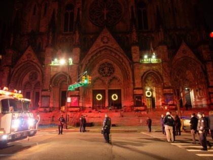 TOPSHOT - Police officers stand guard outside of the Cathedral of St. John the Divine in New York on December 13, 2020, after a shooter opened fire outside the church. - A man was shot and critically injured by police after he opened fire near crowds who had gathered to …