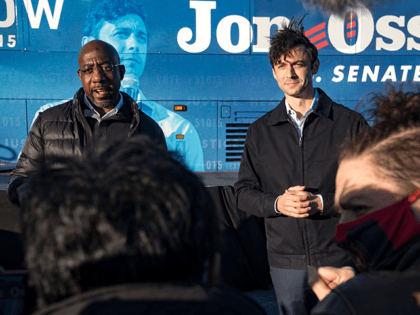 Democratic Candidate for U.S. Senate Jon Ossoff and Rev. Raphael Warnock speak at a campaign event to encourage people to vote on December 14, 2020 in Atlanta, Georgia. Today was the first day of early voting for the runoff election between Ossoff and Sen. David Perdue (R-GA) and Warnock and …