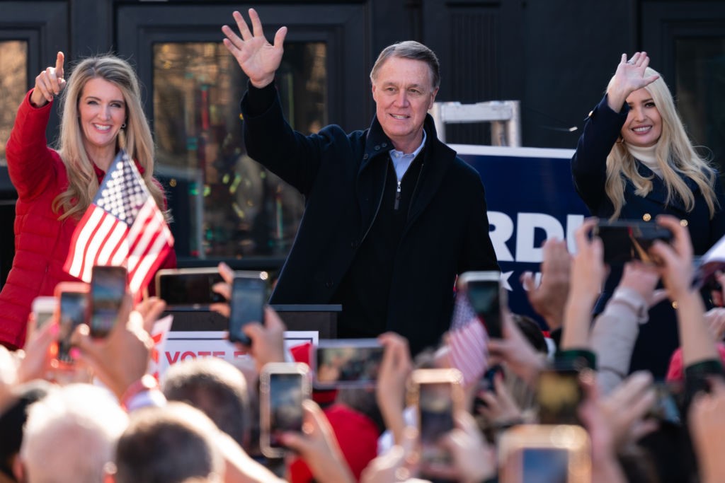MILTON, GA - DECEMBER 21: Ivanka Trump and Senators Kelly Loeffler (R-GA) and David Perdue (R-GA) wave to the crowd at a campaign event on December 21, 2020 in Milton, Georgia. The two Georgia U.S. Senate runoff elections on Jan. 5 will decide control of the Senate. (Photo by Elijah Nouvelage/Getty Images)