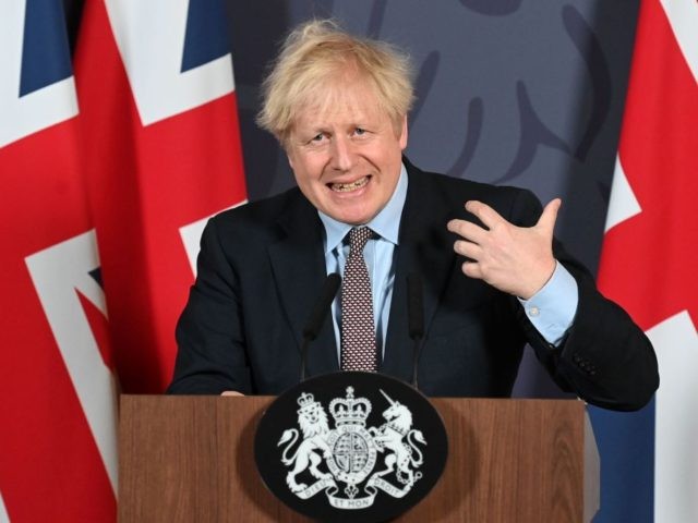 Britain's Prime Minister Boris Johnson holds a remote press conference to update the nation on the post-Brexit trade agreement, inside 10 Downing Street in central London on December 24, 2020. - Britain said on Thursday, December 24, 2020 an agreement had been secured on the country's future relationship with the …