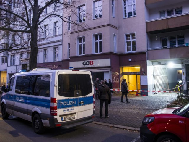Policemen work at a crime scene in Berlin's Kreuzberg district on December 26, 2020,