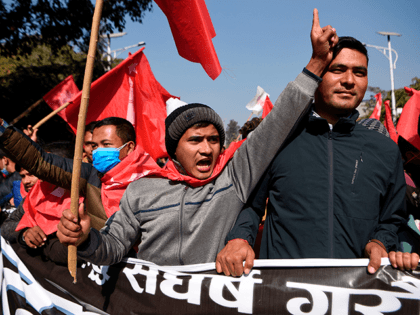 Protesters shout slogans during a demonstration against the dissolution of the country's parliament in Kathmandu on December 29, 2020. (Photo by PRAKASH MATHEMA / AFP) (Photo by PRAKASH MATHEMA/AFP via Getty Images)