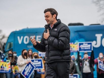 MARIETTA, GA - DECEMBER 30: Democratic Senate candidate Jon Ossoff speaks at a Latino meet and greet and literature distribution rally on December 30, 2020 in Marietta, Georgia. In the lead-up to the January 5 runoff election, Democratic Senate candidate Jon Ossoff continues to focus on early voting efforts across …