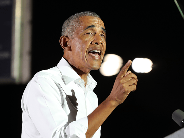 Former President Barack Obama speaks in support of Democratic presidential nominee Joe Biden during a drive-in rally at the Florida International University on November 02, 2020 in Miami, Florida. Mr. Obama is campaigning for his former Vice President before the Nov. 3rd election (Photo by Joe Raedle/Getty Images)