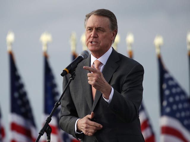 SAVANNAH, GEORGIA - DECEMBER 04: Sen. David Perdue (R-GA) attends a rally with Vice President Mike Pence in support of both he and Sen. Kelly Loeffler (R-GA) on December 04, 2020 in Savannah, Georgia. The Defend the Majority Rally with the senators comes ahead of a crucial runoff election for Perdue and Loeffler on January 5th which will decide who controls the Unite States senate. Loeffler was unable to attend the rally due to a serious accident one of her staff members was involved in. (Photo by Spencer Platt/Getty Images)