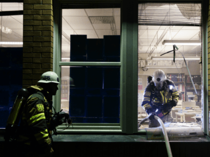 Firemen extinguish a burning school room in the Stockholm suburb of Tensta after youths rioted in few different suburbs around Stockholm and Sweden on May 25, 2013. Stockholm police called in reinforcements from across Sweden on Friday to quell a possible sixth straight night of riots in the capital's immigrant-dominated …