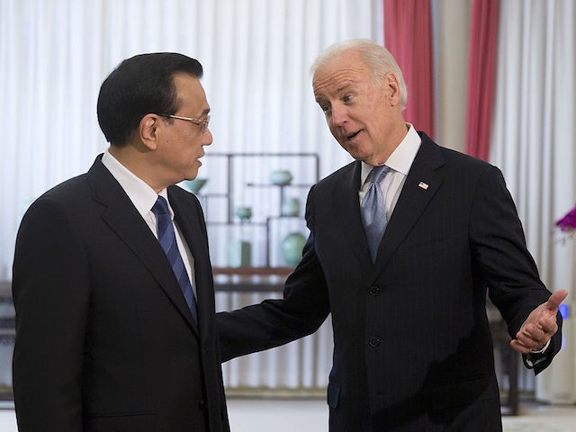 BEIJING, CHINA - DECEMBER 05: U.S. Vice President Joe Biden (R), chats with Chinese Premie