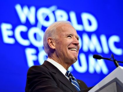 Outgoing US vice president Joe Biden arrives on stage to address the assembly on the second day of the World Economic Forum, on January 18, 2017 in Davos. - With the world's elite holding its breath until Donald Trump becomes the next US president, outgoing Vice-President Joe Biden addresses the …