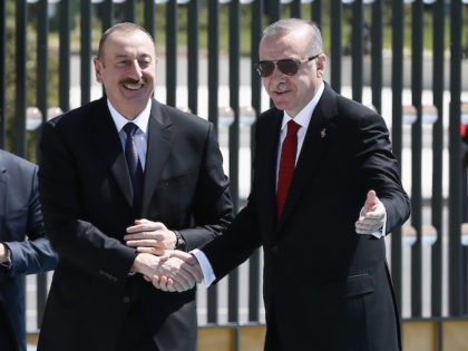 ANARKA, TURKEY - APRIL 25: In this handout photo provided by The Turkish President Press office, Turkish President Recep Tayyip Erdogan (R) with Ilham Aliyev, President of the Republic of Azerbaijan (L) at Turkish Presidental Palace in on Apil 25, 2018 in Ankara, Turkey. (Photo by Turkish President Press Office …