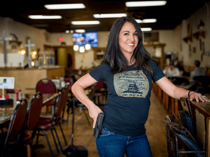 Owner Lauren Boebert poses for a portrait at Shooters Grill in Rifle, Colorado on April 24, 2018. - Lauren Boebert opened Shooters Grill in 2013 with her husband Jason in the small town of Rifle, Colorado, the only city in the United States named after a gun according to them. …