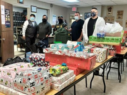 Border Patrol agents from the Fallen Agents Fund prepare to deliver Christmas presents to the families of fallen Border Patrol agents. (Photo: The Fallen Agents Fund)
