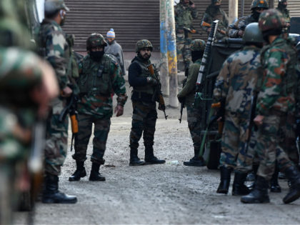 Indian army soldiers stand guard near the site of a shootout where two soldiers were allegedly killed by the suspected militants on the outskirts of Srinagar on November 26, 2020. (Photo by TAUSEEF MUSTAFA / AFP) (Photo by TAUSEEF MUSTAFA/AFP via Getty Images)