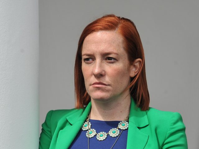 White House Communications Director Jen Psaki listens to US President Barack Obama makes a statement at the White House in Washington, DC, on April 2, 2015 after a deal was reached on Iran's nuclear program. Iran and world powers agreed on the framework of a potentially historic deal aimed at …