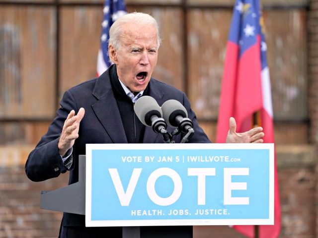 ATLANTA, GA - DECEMBER 15: U.S. President-elect Joe Biden speaks during a drive-in rally for U.S. Senate candidates Jon Ossoff and Rev. Raphael Warnock at Pullman Yard on December 15, 2020 in Atlanta, Georgia. Biden's stop in Georgia comes less than a month before the January 5 runoff election for …