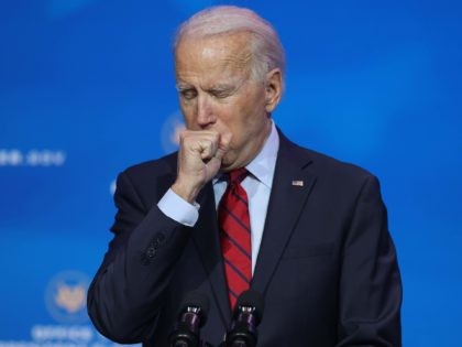 Joe Biden coughs (Chip Somodevilla / Getty)