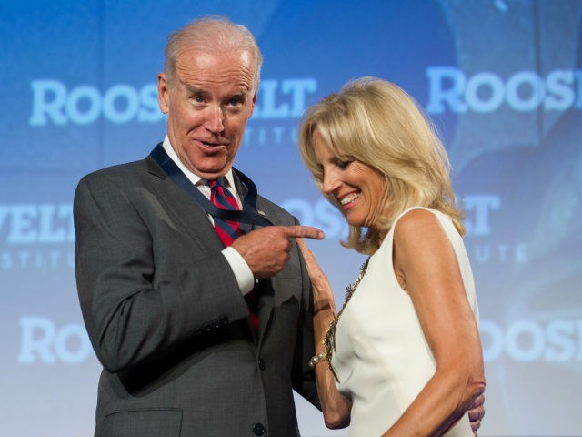 Vice President Joe Biden points to his wife Dr. Jill Biden after receiving the Roosevelt I