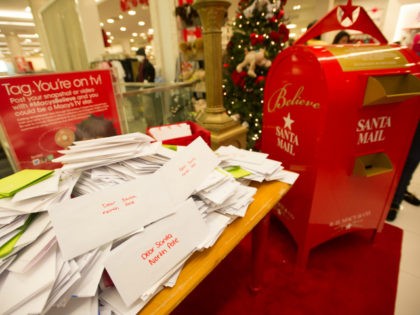 Letters to Santa are seen at the Macy's Believe launch event at Macy's department store on Friday, Nov. 8, 2013 in Warwick, Rhode Island. Macy’s “Believe” campaign invites children of all ages to mail their letters to Santa using Macy’s red Santa Mail letterboxes. For every letter mailed now through …