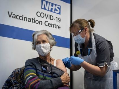 LONDON, ENGLAND - DECEMBER 08: Dr, Doreen Brown, 85, receives the first of two Pfizer/BioN