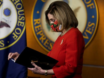 Speaker of the House Nancy Pelosi (D-CA) looks on during a press conference on Capitol Hill on December 20, 2020 in Washington, DC. Republicans and Democrats in the Senate finally came to an agreement on the coronavirus relief bill and a vote is expected on Monday. (Photo by Tasos Katopodis/Getty …