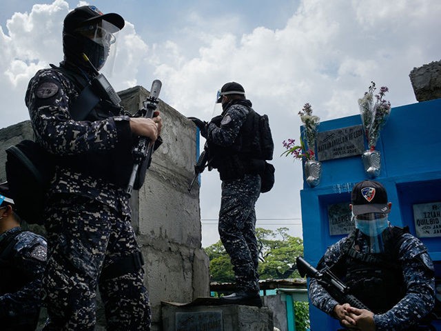 MANILA, PHILIPPINES - OCTOBER 16: Armed jail guards and police secure the perimiter of a l