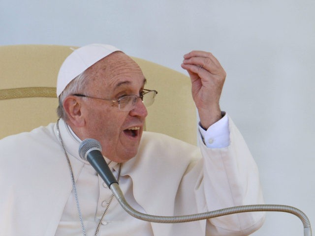 Pope Francis speaks to engaged couples during a Valentine's Day celebration in St Peter's square at the Vatican on February 14, 2014. The Vatican said there were around 20,000 future brides and grooms attending from 25 countries, all of them enrolled on Catholic marriage preparation courses. The celebration was not …