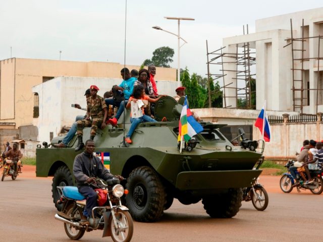 A Russian armoured personnel carrier (APC) is seen driving in the street during the delivery of armoured vehicles to the Central African Republic army in Bangui, Central African Republic, on October 15, 2020. (Photo by Camille Laffont / AFP) (Photo by CAMILLE LAFFONT/AFP via Getty Images)
