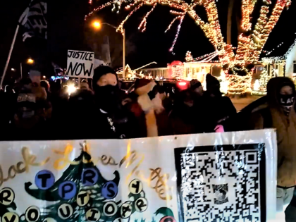 BLM The People's Revolution marchers disrupt a Candy Cane Lane children's cancer fundraiser in Wisconsin. (YouTube Video Screenshot/The People's Revolution)