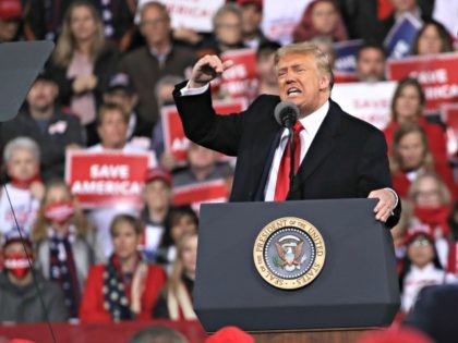 VALDOSTA, GEORGIA - DECEMBER 05: President Donald Trump attends a rally in support of Sen. David Perdue (R-GA) and Sen. Kelly Loeffler (R-GA) on December 05, 2020 in Valdosta, Georgia. The rally with the senators comes ahead of a crucial runoff election for Perdue and Loeffler on January 5th which …