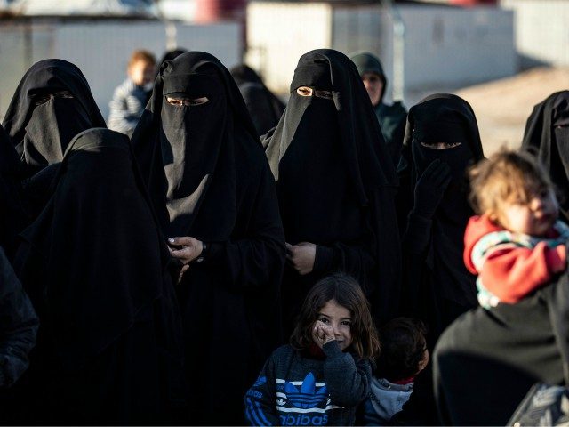 Syrians wait to leave the Kurdish-run al-Hol camp holding relatives of alleged Islamic Sta