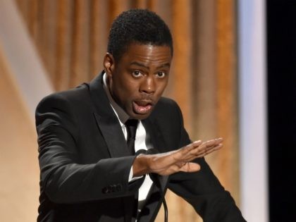 HOLLYWOOD, CA - NOVEMBER 08: Comedian Chris Rock speaks onstage during the Academy Of Motion Picture Arts And Sciences' 2014 Governors Awards at The Ray Dolby Ballroom at Hollywood & Highland Center on November 8, 2014 in Hollywood, California. (Photo by Kevin Winter/Getty Images)