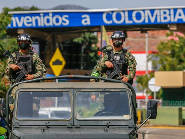 Colombian Military Police officers patrol the surroundings of the Simon Bolivar Internatio