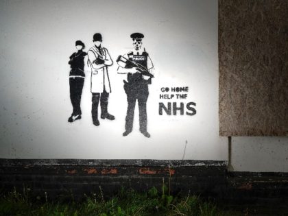 BURY, UNITED KINGDOM - MAY 18: Graffiti art declaring 'Go Home Help The NHS' adorns the wa