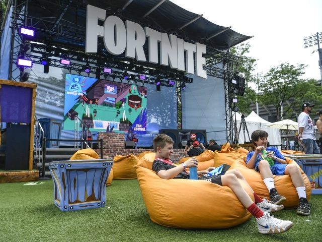 NEW YORK, NEW YORK - JULY 26: Fans attend day one of the Fortnite World Cup Finals at Arthur Ashe Stadium on July 26, 2019 in the Queens borough of New York City. (Photo by Sarah Stier/Getty Images)