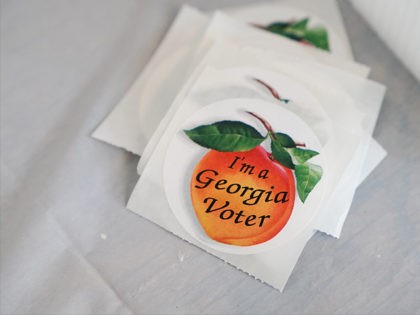 ATLANTA, GA - JUNE 09: A stack of "I'm a Georgia Voter" stickers are seen at a polling location on June 9, 2020 in Atlanta, Georgia. Georgia, West Virginia, South Carolina, North Dakota, and Nevada are holding primaries amid the coroanvirus pandemic (Photo by Elijah Nouvelage/Getty Images)
