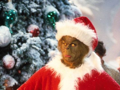 381271 01: Jim Carrey Stars As The Grinch, The Green Monster Who Disguises Himself As Santa Claus And Burglarizes Every Single House In The Village Of Whoville On Christmas Eve In The Live-Action Adaptation Of The Famous Christmas Tale, "Dr. Seuss' How The Grinch Stole Christmas," Directed By Ron Howard. …