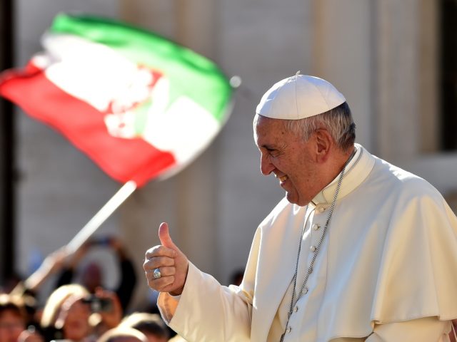 Pope Francis thumbs up as he arrives for his weekly general audience in the St Peter's squ