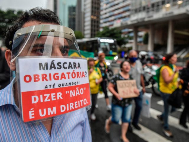 Demonstrators protest against Sao Paulo's governor Joao Doria and the vaccination with Chi