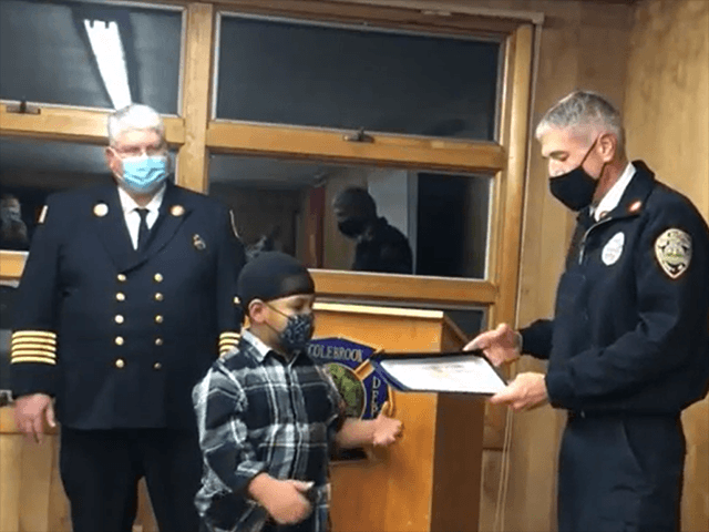 New Hampshire Fire Marshals award Denali Duval for alerting family of home fire