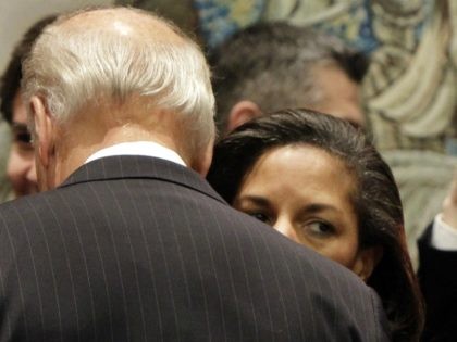 FILE - In this Dec. 15, 2010, file photo Susan Rice, the U.S. ambassador to the United Nations, whispers in the ear of Vice President Joe Biden in the United Nations Security Council, at U.N. headquarters. Democratic presidential nominee Joe Biden is in the final stages of selecting his running …
