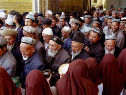 Muslim Uighur men leave after a service at the Idkah Mosque in April, 26 2002 in Kashgar, Xinjiang Region, China. China has demanded the repatriation of Uighur fighters captured alongside the Taliban in Aghanstan. China is concerned about Uighur separatist fighting for their own country in the Northwest of China …
