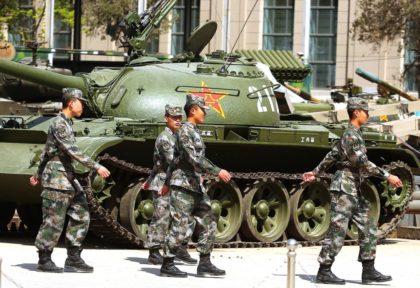 China shows off tanks in simulated battle for Taiwan