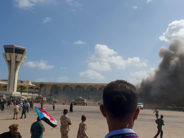 Smoke billows at the Aden Airport on December 30, 2020, after explosions rocked the Yemeni